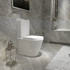 Oakham round rimless close coupled toilet in a modern grey bathroom
