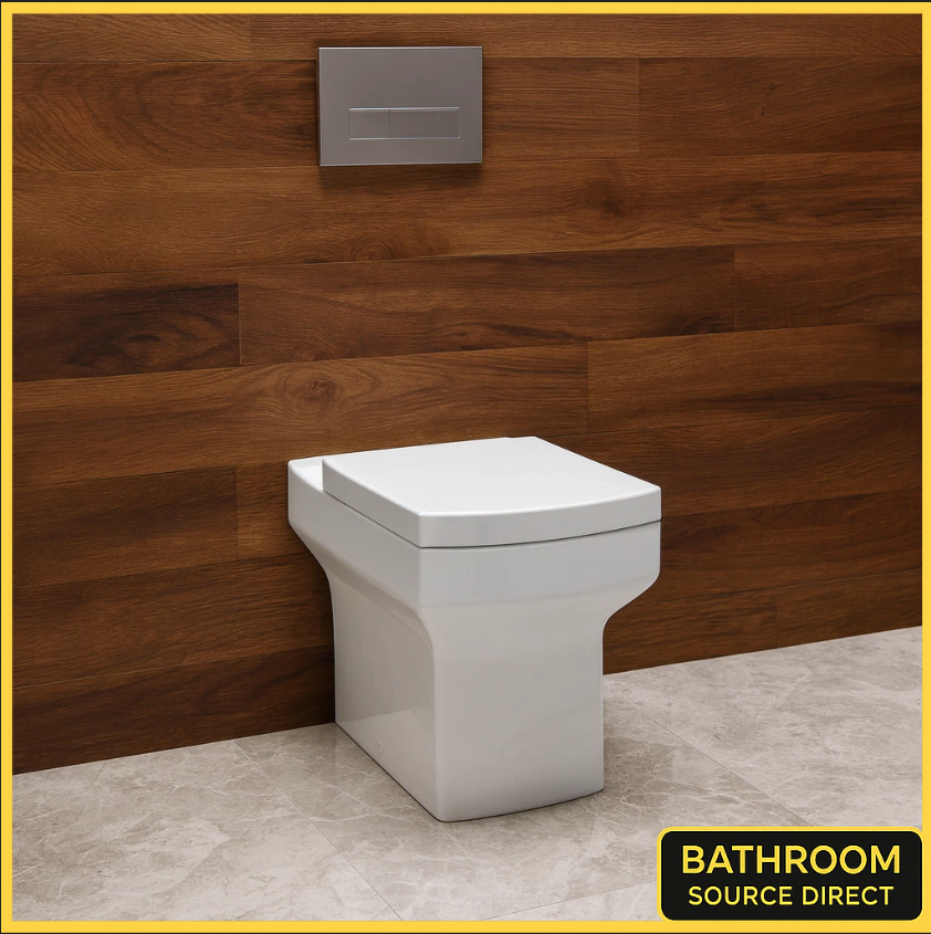 White toilet against a wooden wall with 'Bathroom Source Direct' branding.