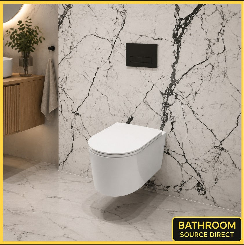Oakham rimless wall hung toilet in a marble tiled bathroom with black flush plate