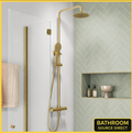 Orin round brushed brass thermostatic shower set with overhead shower and handset in modern bathroom