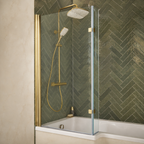 Ottone brass L shaped shower bath screen shown in the opposite handed installation with green herringbone tiles