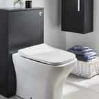 Purity matt black WC unit installed with a back to wall toilet