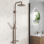 Scudo Core brushed bronze rigid riser shower in a modern bathroom