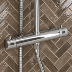Close up of the Scudo Core chrome thermostatic bar valve and controls