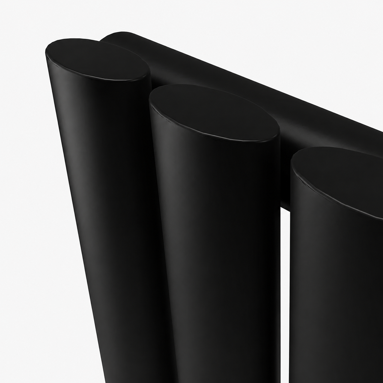 Three black cylindrical objects on a white background