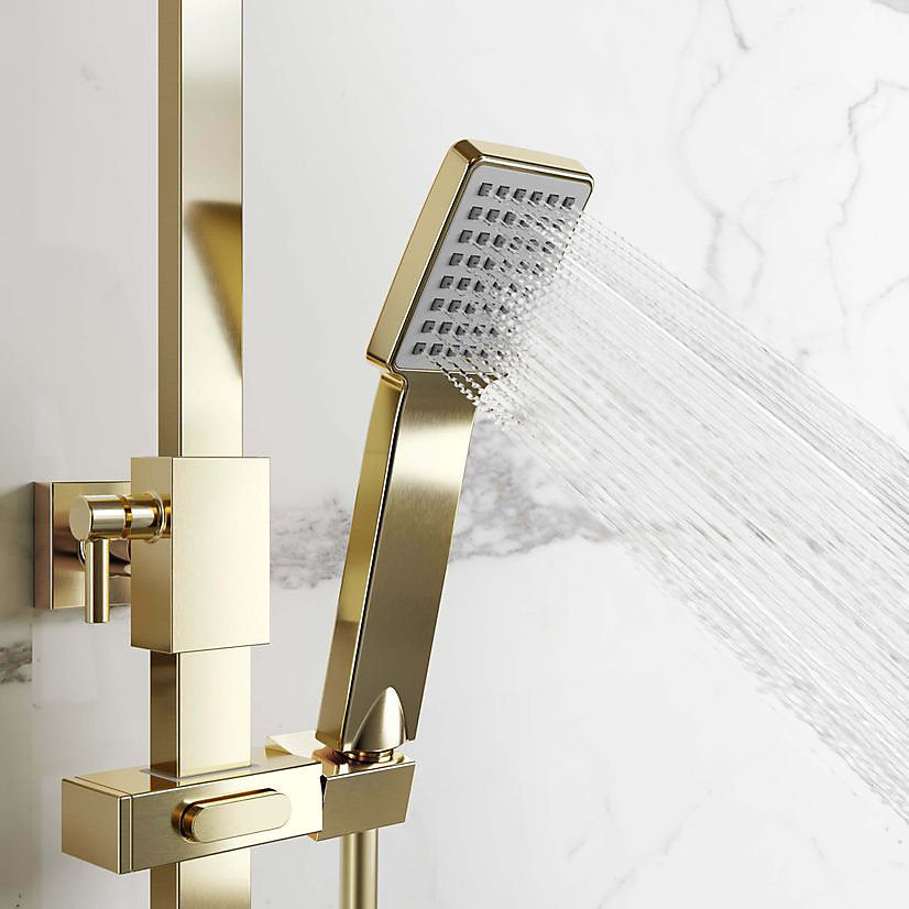 Square handheld shower head in brushed brass finish
