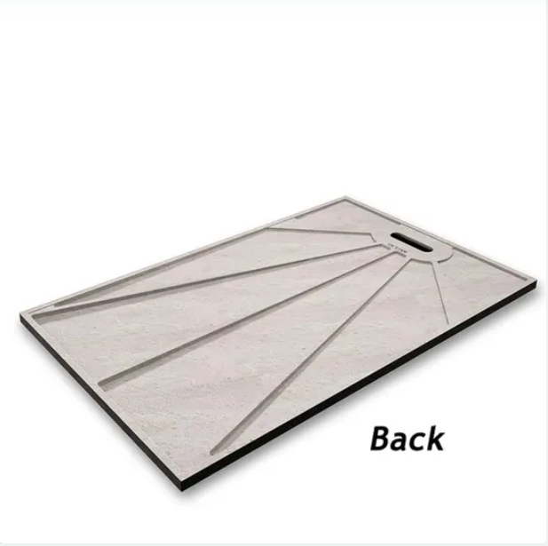 Underside of stone resin shower tray showing reinforced support structure for durability