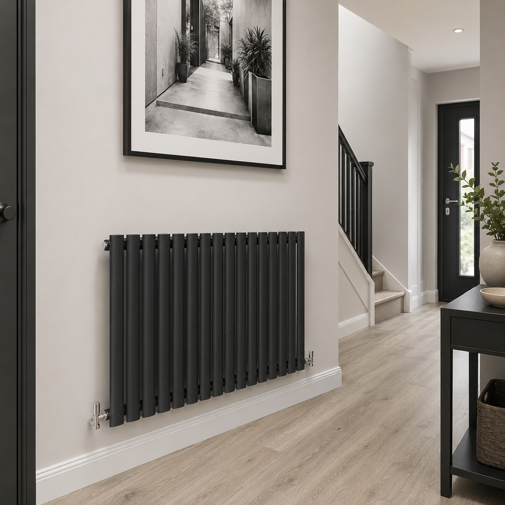 Anthracite horizontal oval column radiator in modern hallway setting 600 x 1003mm