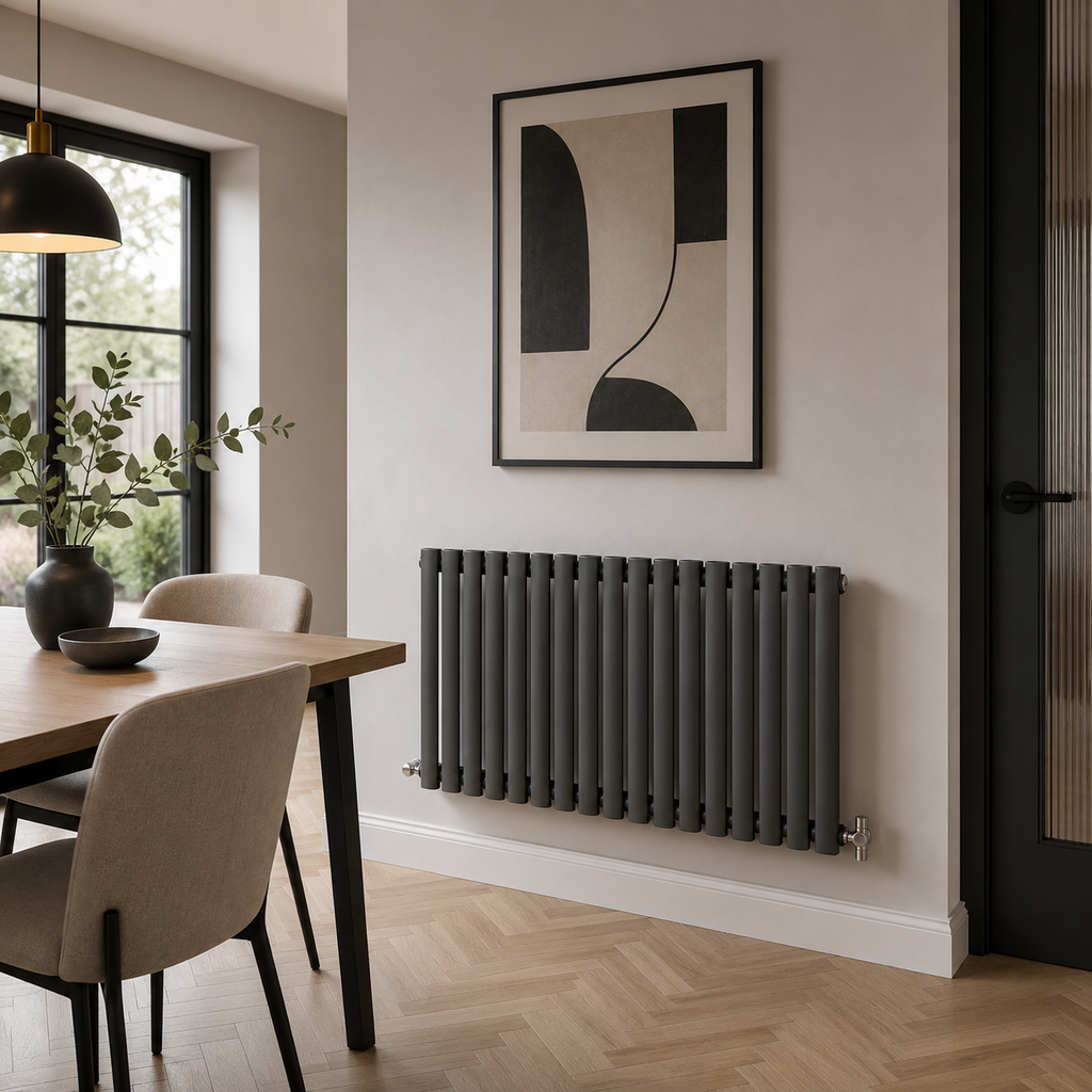 Black horizontal oval column radiator in modern dining room setting 600 x 1003mm