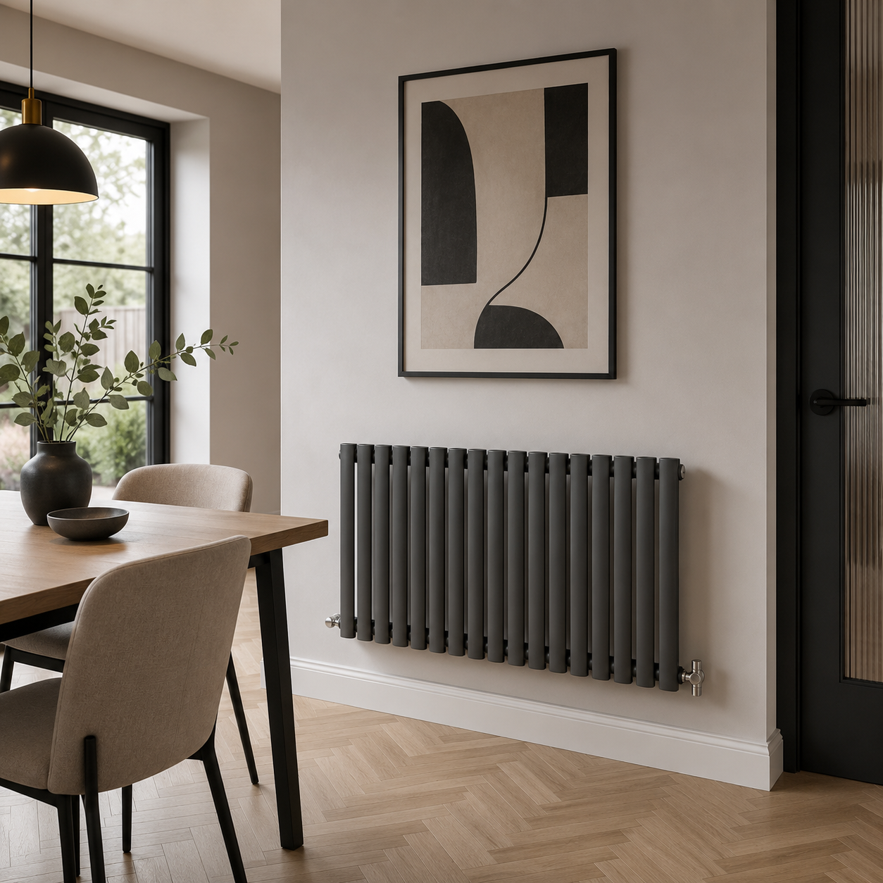 Black horizontal oval column radiator in modern dining room setting 600 x 1003mm