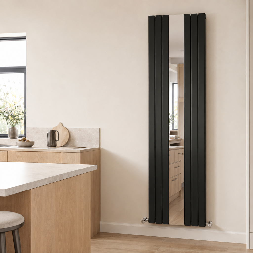 Thermwell black mirrored vertical radiator installed in a modern bathroom
