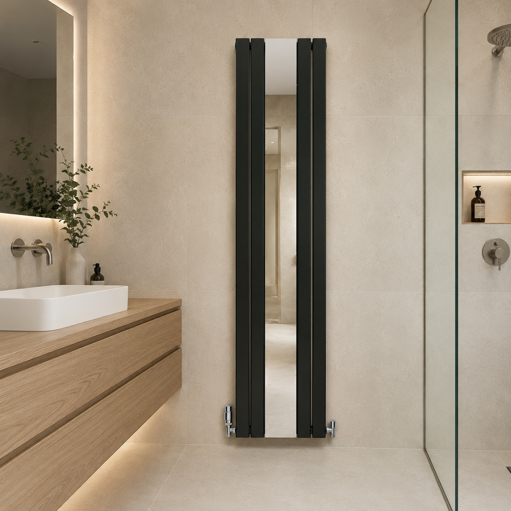 Thermwell matt black mirrored vertical radiator wall mounted beside a bathroom vanity