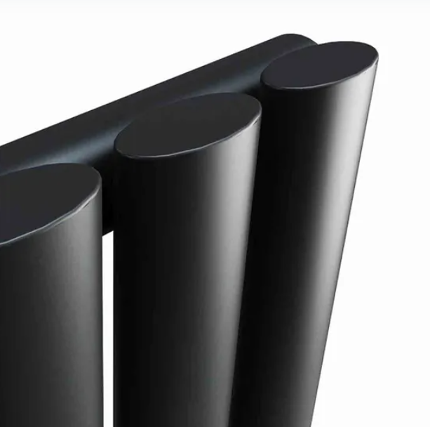 Close up detail of black oval column radiator tubes and finish