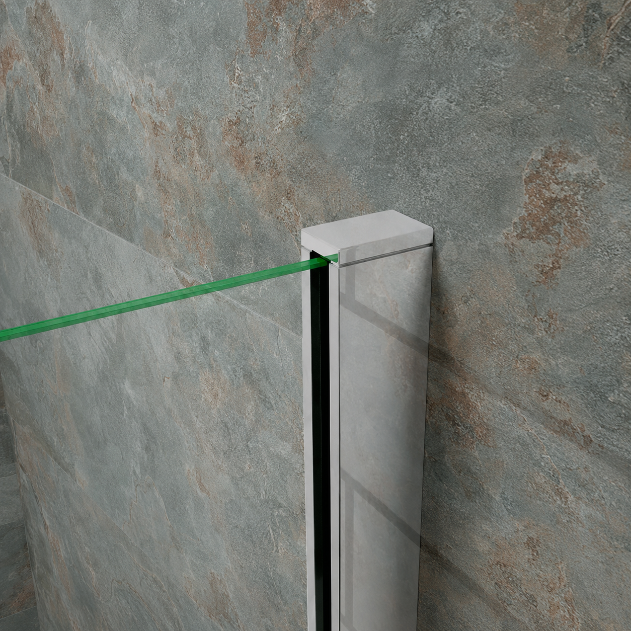 Close-up of the chrome wall profile and 8mm glass edge on the Vitrano shower screen