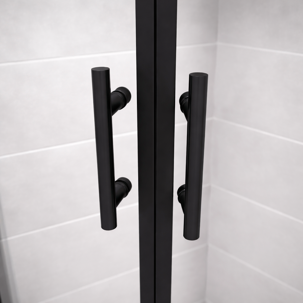 Black shower door with handles on a white tiled wall