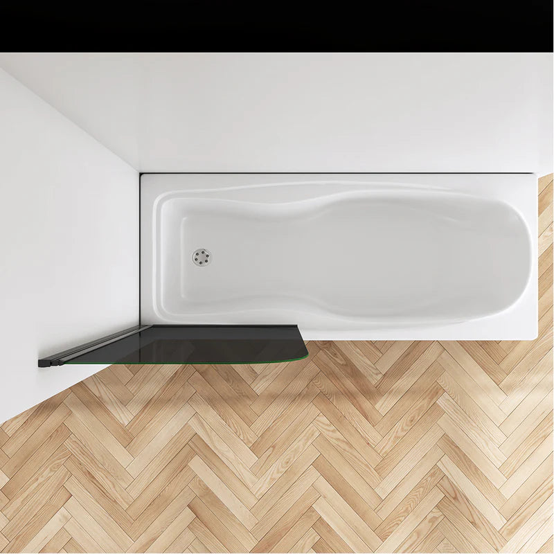 Black framed bath shower screen installed in modern bathroom with feature wall
