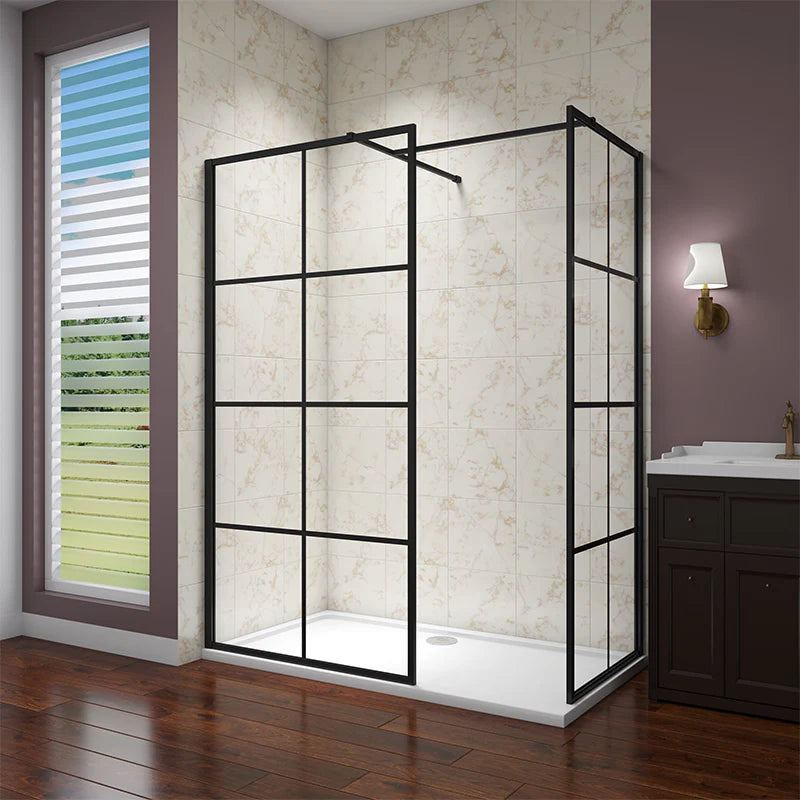 Corner shower enclosure in a bathroom with tiled walls and wooden floor.