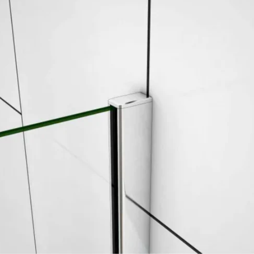 Close-up of chrome bath shower screen wall profile fixing and glass panel installation