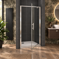 Vitrano chrome pivot shower door with 6mm clear glass shown open in a modern bathroom
