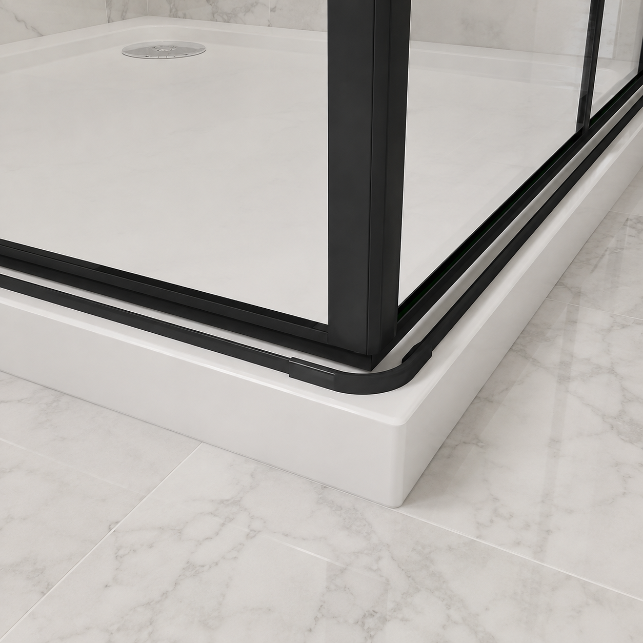 Close up of the matt black bottom rail and water bar on the Vitrano double bi fold shower enclosure