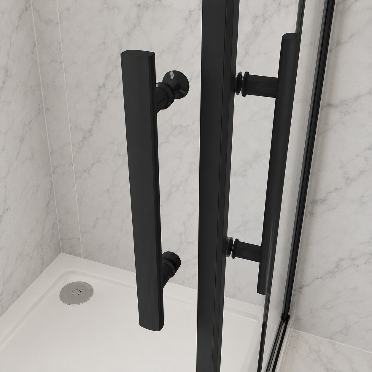 Close up of the twin matt black bar handles on the Vitrano double bi fold shower enclosure