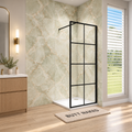Vitrano grid matt black walk in shower screen with 8mm clear glass in a premium bathroom