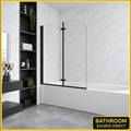 Vitrano matt black 2 fold pivot bath screen fitted over a white bath
