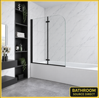 Vitrano matt black 2 fold pivot bath screen fitted over a white bath