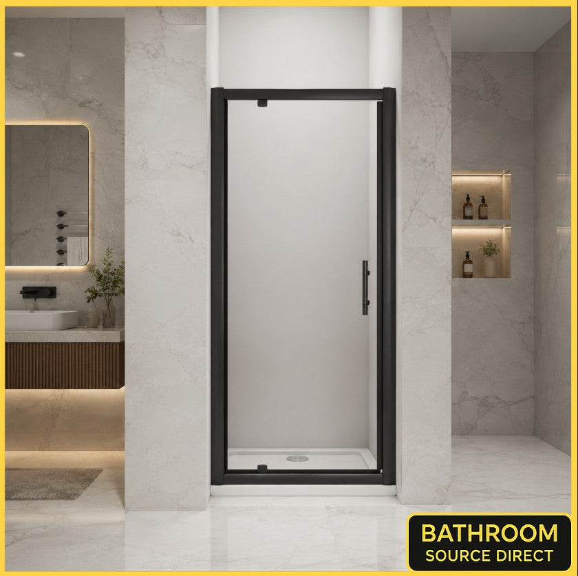 Vitrano matt black pivot shower door with 6mm easy clean glass in a modern Carrara marble bathroom