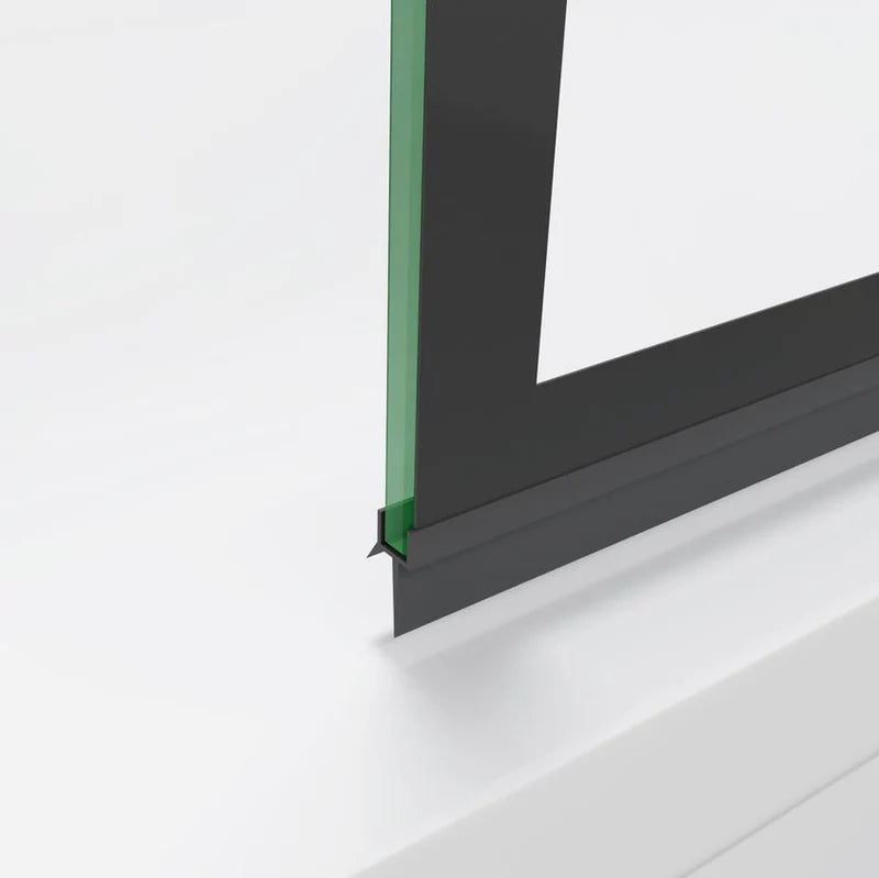 Close-up of shower screen bottom seal and black aluminium profile with glass panel