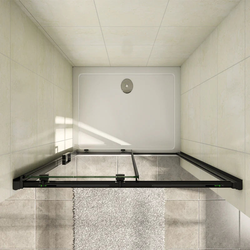 Overhead view of the Vitrano matt black sliding shower door showing the recess installation and shower tray