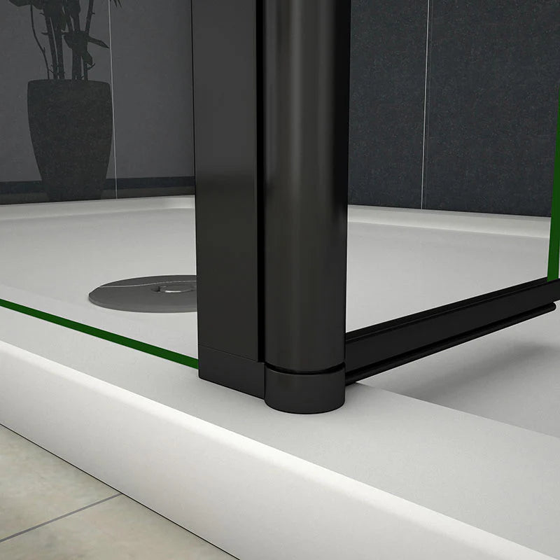 Close-up of black aluminium wall profile fixing at base of walk-in shower screen
