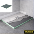 Square wet room shower tray former kit with centre drain installed under tiles showing layered construction